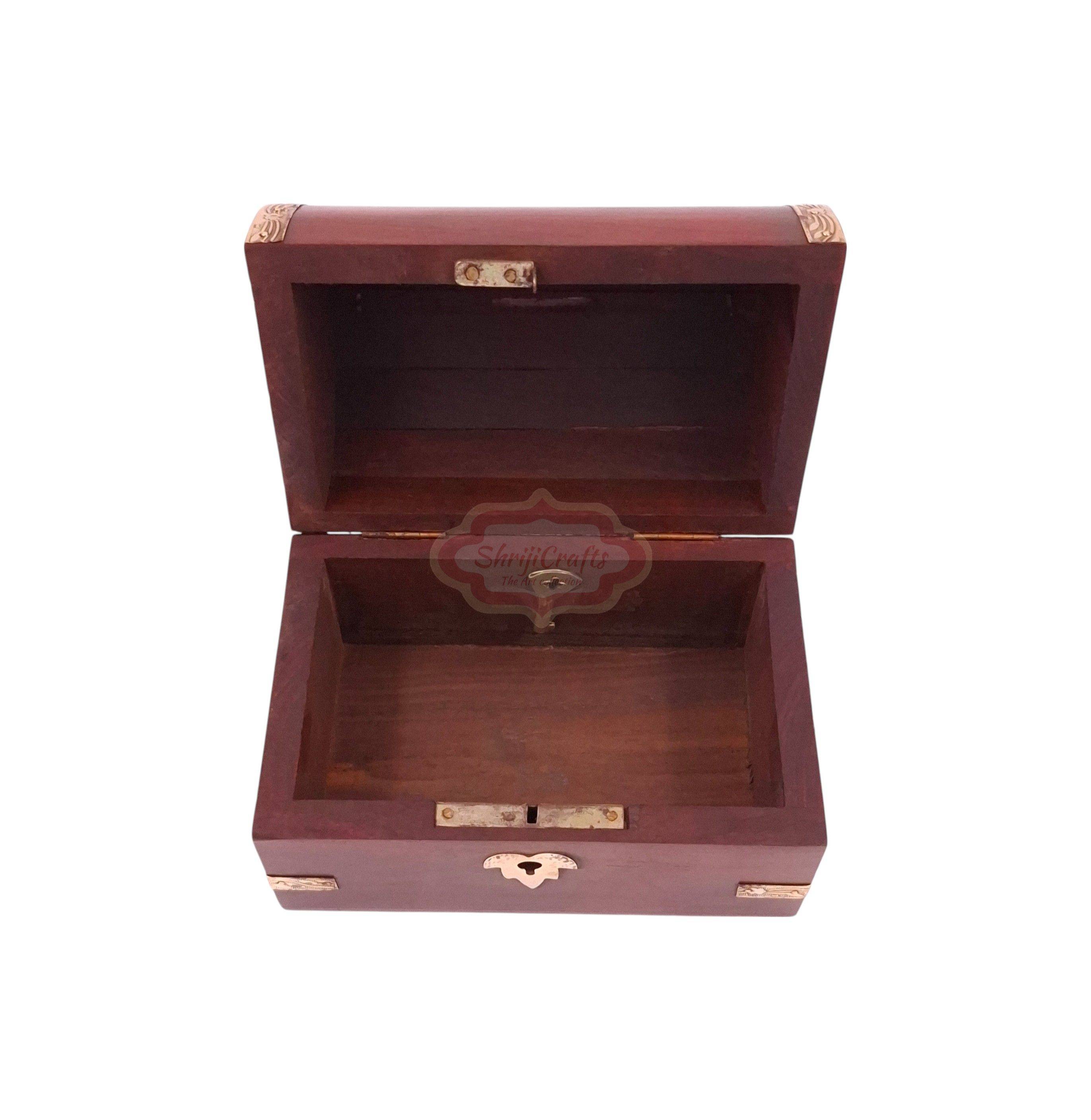 Handcrafted treasure chest-style wooden money bank with a coin slot, secure lock, and key - View 6