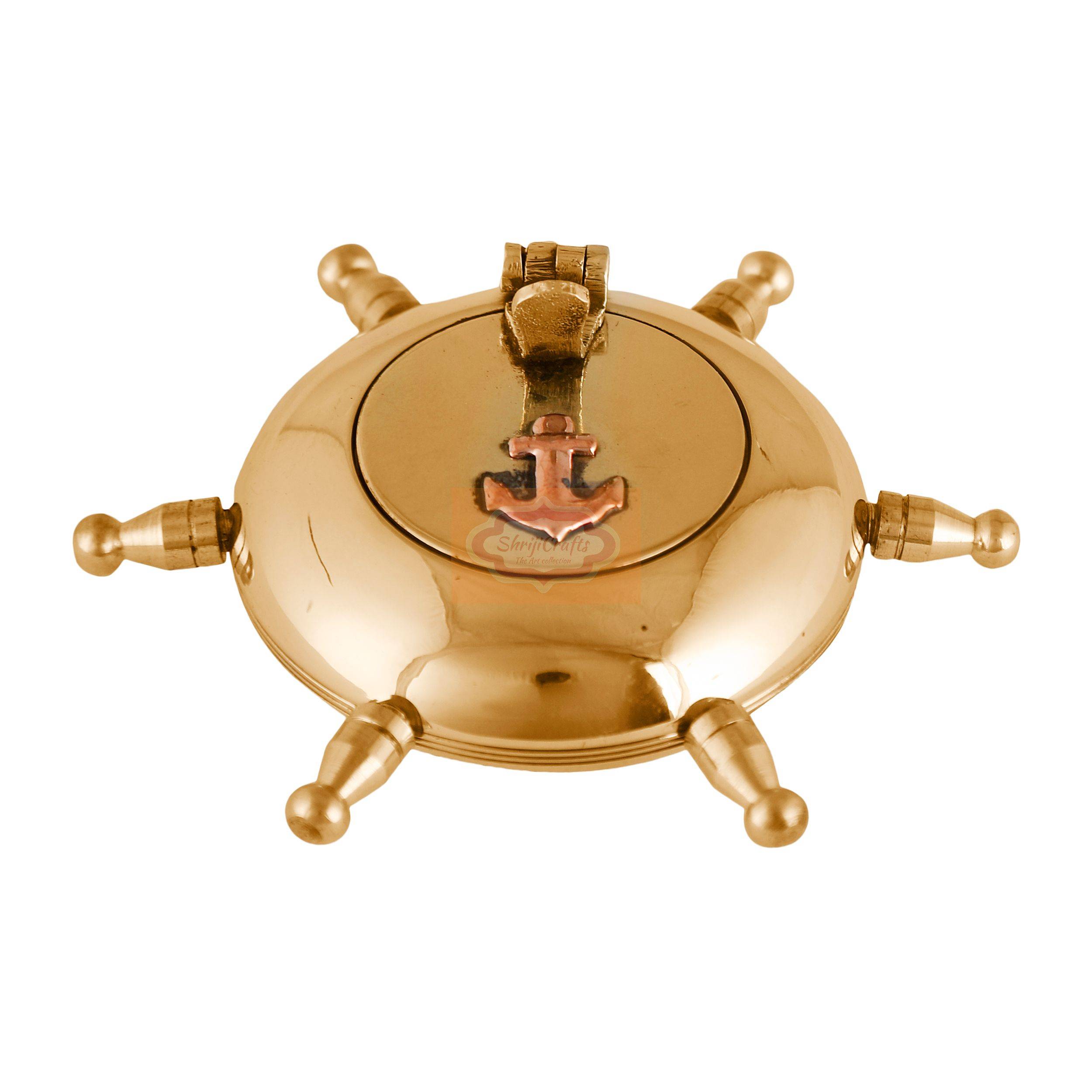 Handcrafted brass ashtray with a unique ship wheel design and rotating lid - View 2