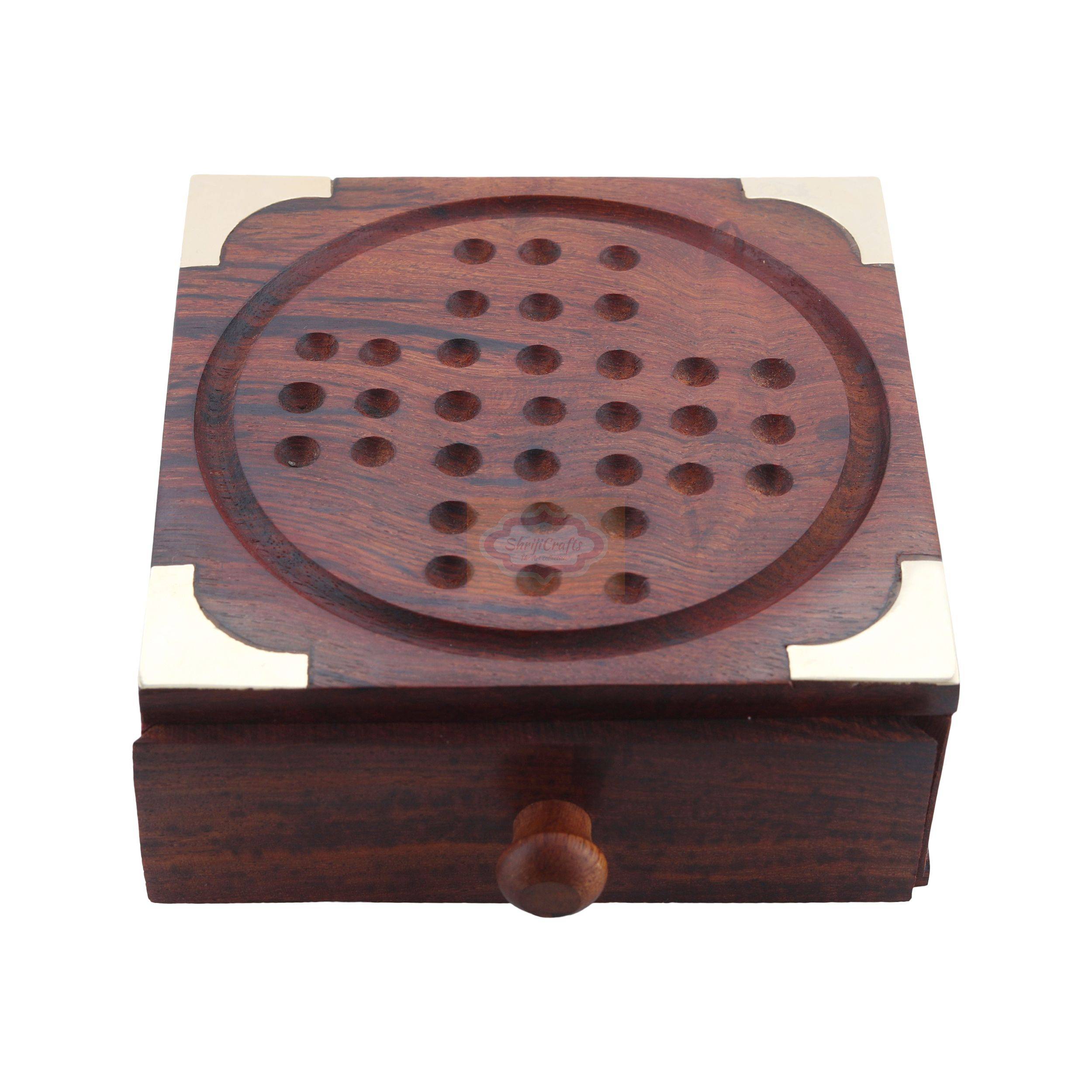 Handcrafted Sheesham wood solitaire board with elegant brass accents and stainless steel playing balls — handcrafted wooden product by Shrijicrafts