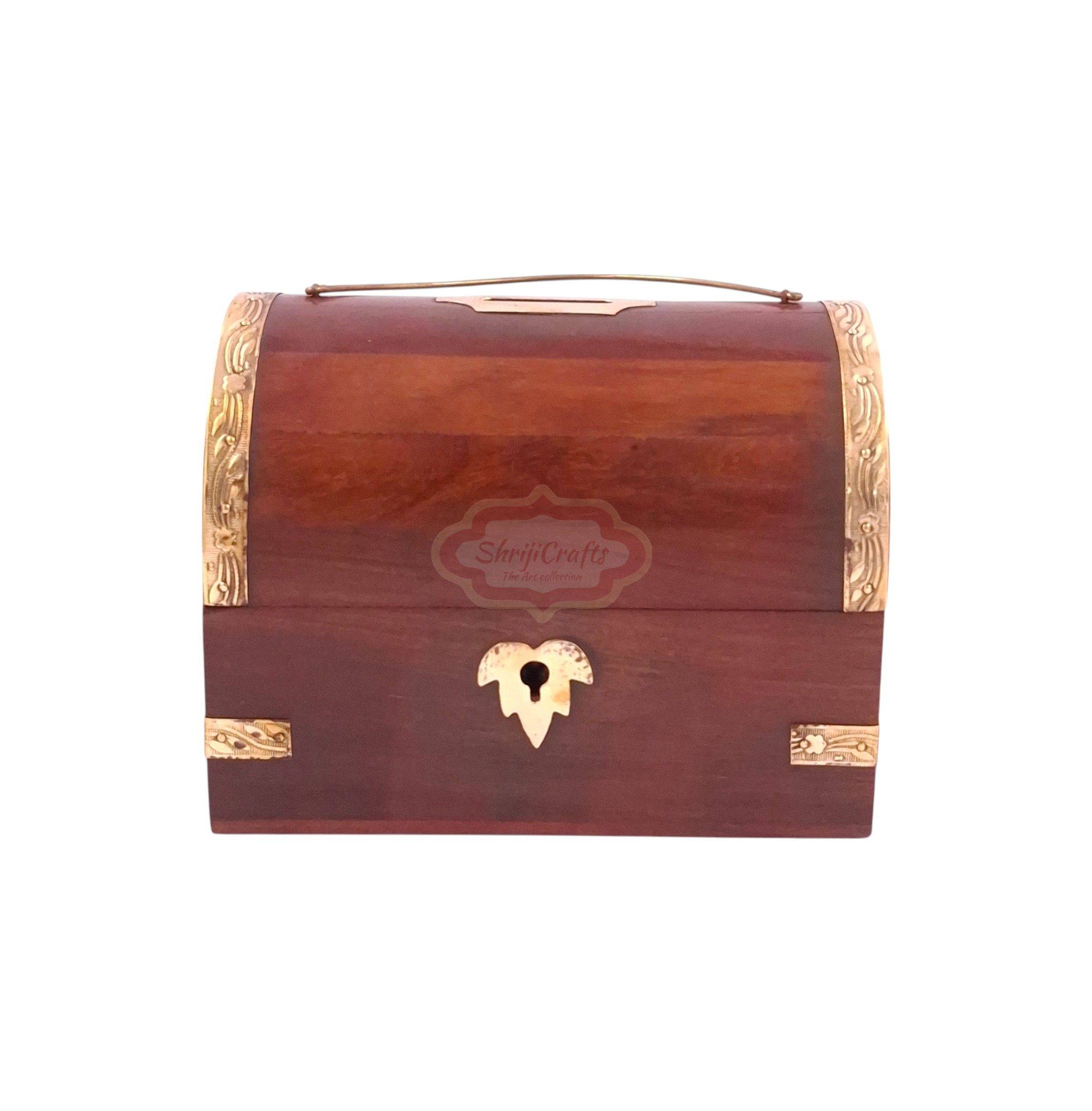 Handcrafted treasure chest-style wooden money bank with a coin slot, secure lock, and key - View 4