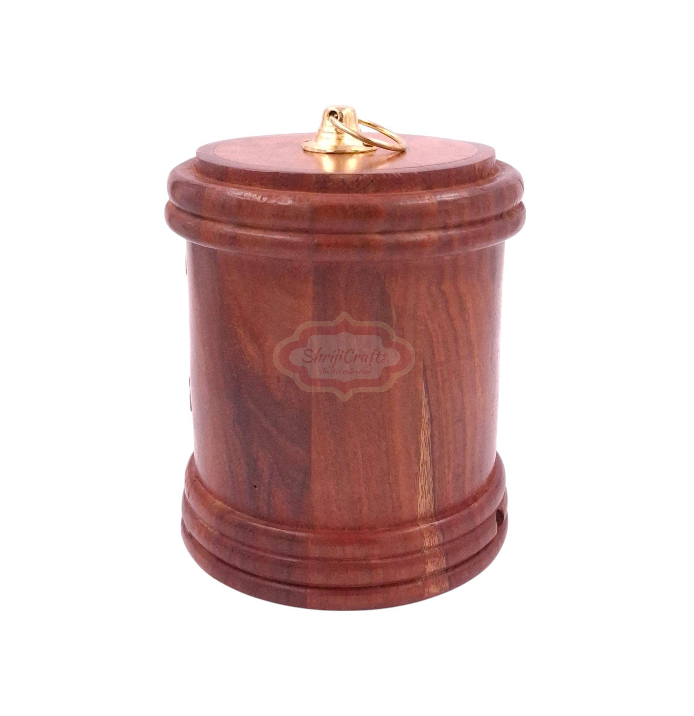 Handcrafted round wooden money bank with a coin slot, secure lock, and key - View 3