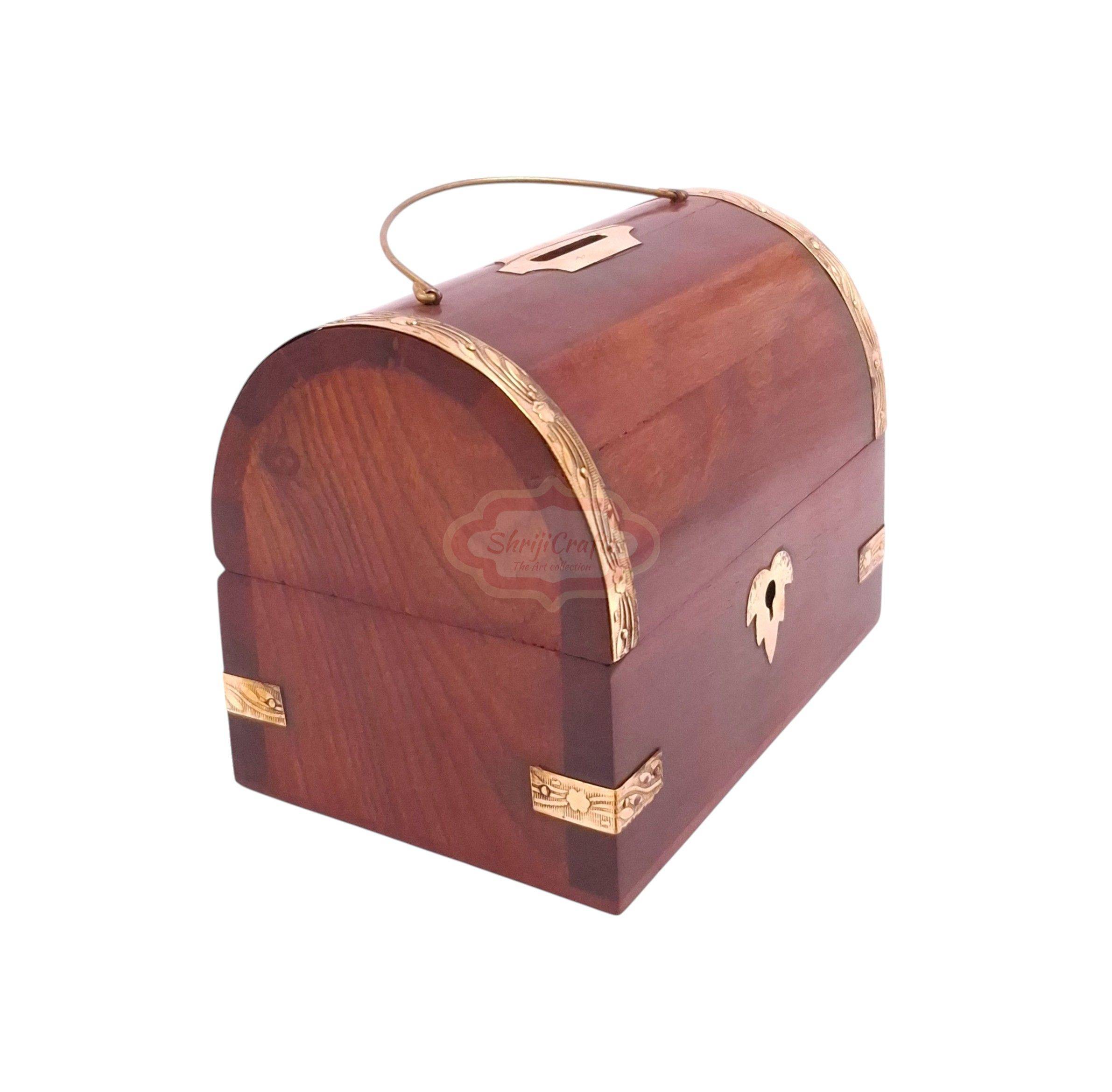 Handcrafted treasure chest-style wooden money bank with a coin slot, secure lock, and key - View 2