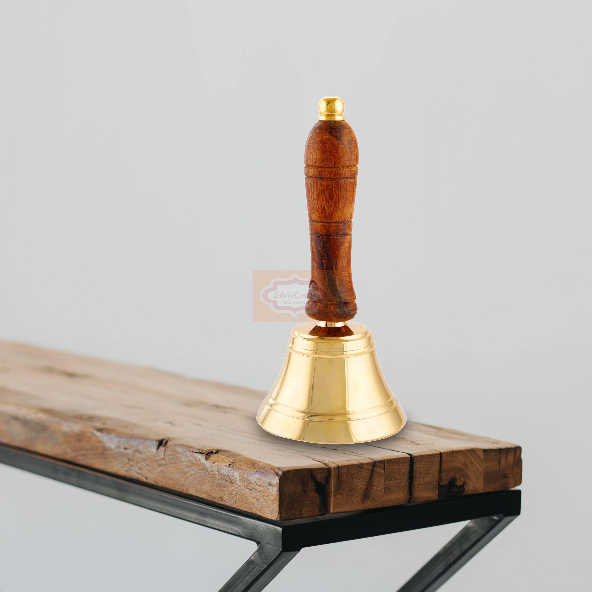 Handcrafted solid brass hand bell with a polished finish and comfortable wooden handle - View 3