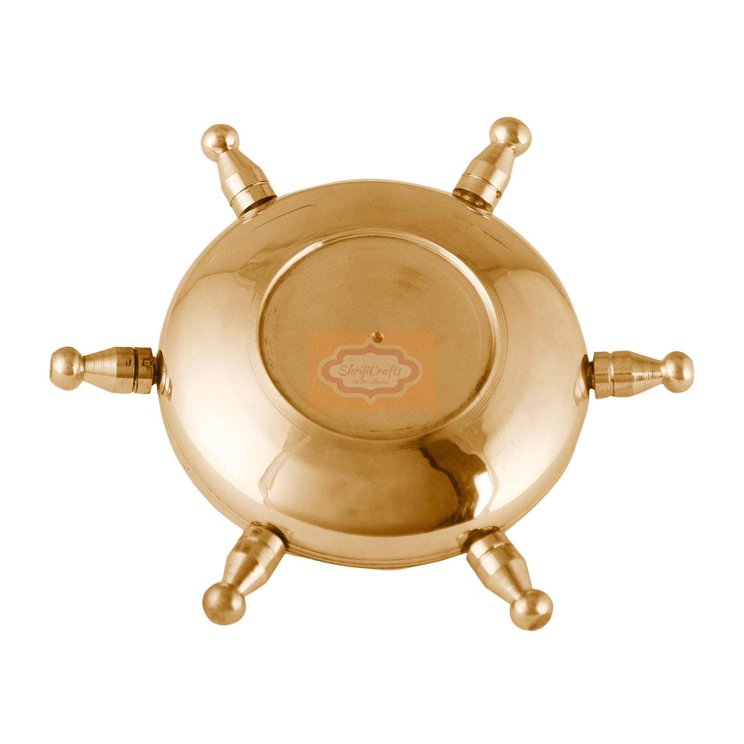Handcrafted brass ashtray with a unique ship wheel design and rotating lid - View 4